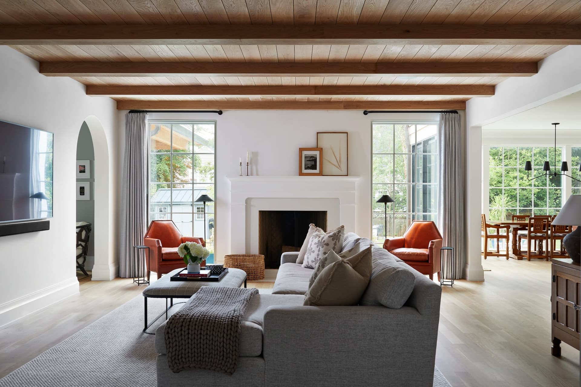 Open-concept family room with a planked wood ceiling in a custom new construction home in Westfield, NJ, built by Michael Robert Construction