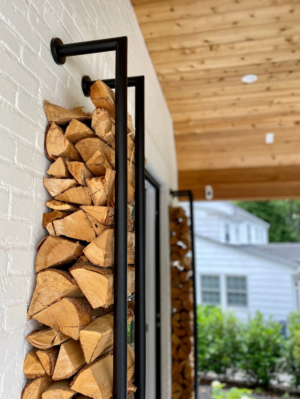 Pergola with Wood Storage in New Home in Westfield, NJ