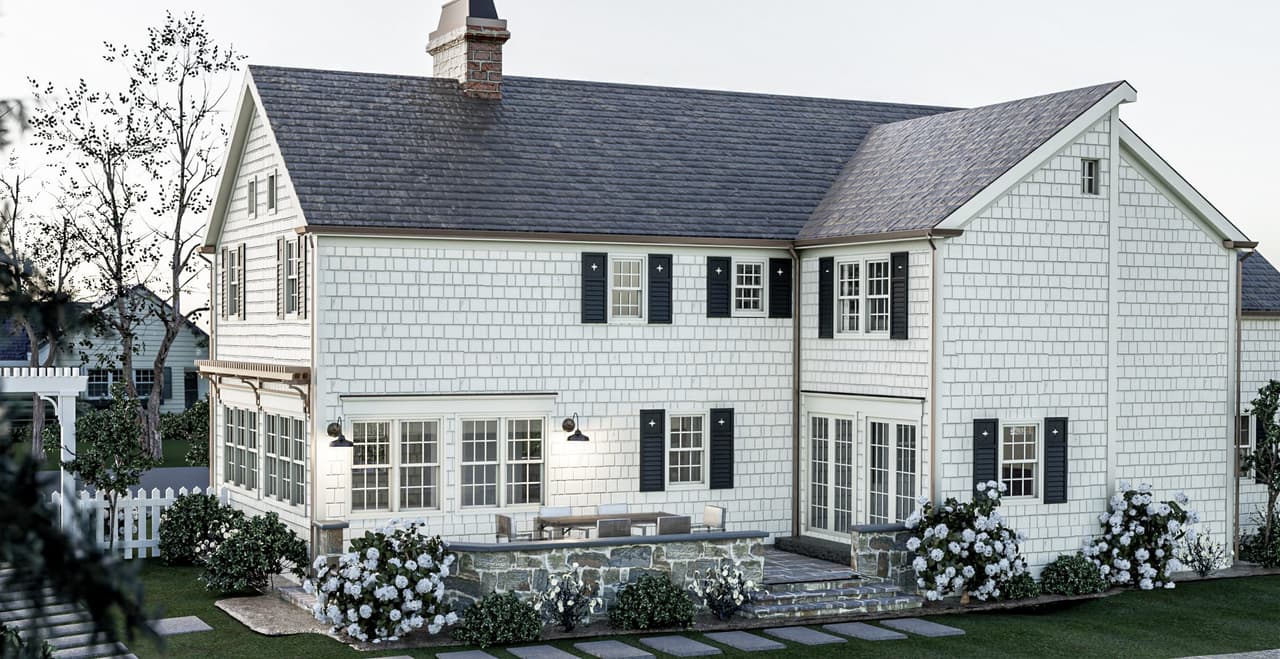 Architectural rendering of a classic shingled home renovation in Westfield, NJ from the rear patio, with black shutters, a covered porch and a lawn beyond