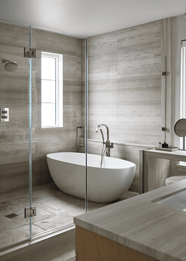 Wet room in the primary bathroom of a Mendham, NJ home, with a freestanding tub and a shower sharing one tiled enclosure behind glass