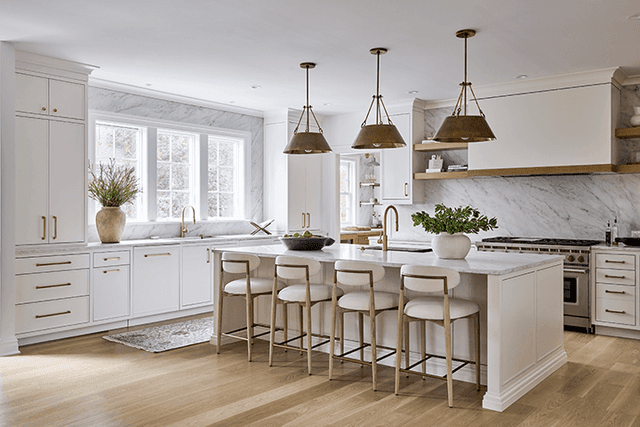 Neutral kitchen with marble and brass in lkuxury renovation in Summit NJ