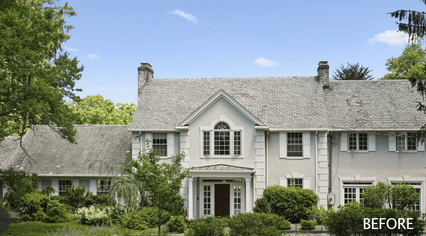Before photograph of the existing home in Mendham, NJ, a shingled house behind mature planting, labeled Before in the corner